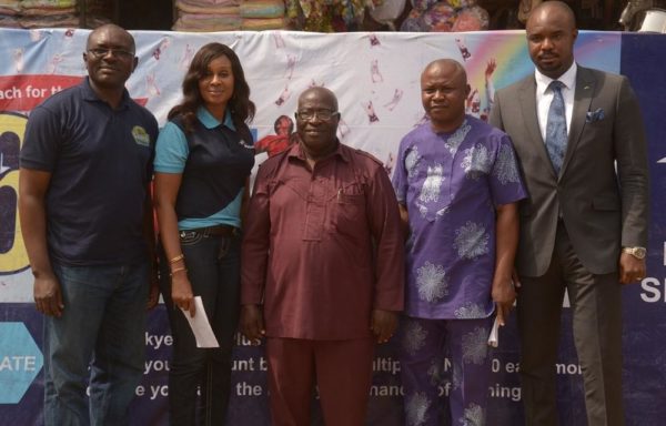 L-R: Business Development Manager, Eziukwu Road Branch , Aba, Chinedu Oguejiofor, Head, Retail Banking ,Nkolika Okoli, Chairman, Ariaria International Market, Elder Emeka Igara, Secretary, Ariaria International Market, Elder Uwakwe Chimaobi and Regional Director , South East 2, Chukwudi Onuegbu at the Bank's “Reach For The Skye” reward draw held in Ariaria International Market, Aba in Abia State on 21st January , 2016