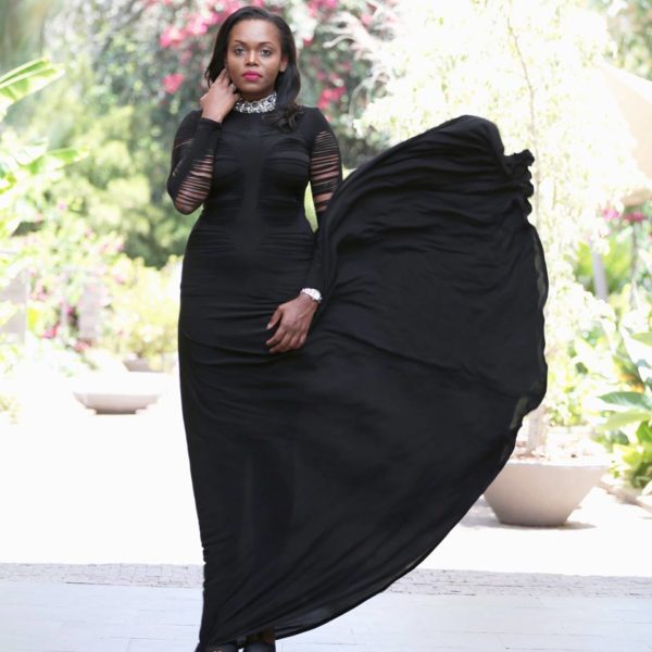 Diana Opoti wearing a stunning slashed black number by Zimbabwe's David Alford