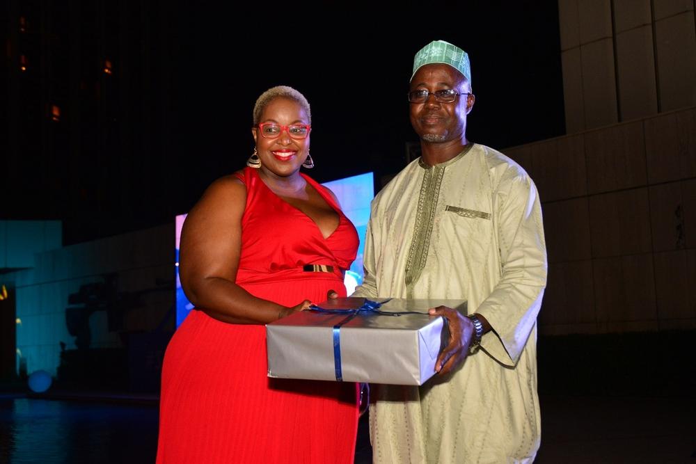 Lusanda Jiya, SAA GM Stakeholder Relations presents gift to Mr Hassan Musa, the Director of Air Transport, Ministry of Transportation