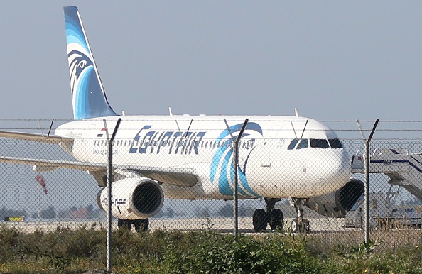 An EgyptAir Airbus A-320 sits on the tarmac of Larnaca airport after it was hijacked and diverted to Cyprus on March 29, 2016. / AFP / STR (Photo credit should read STR/AFP/Getty Images)