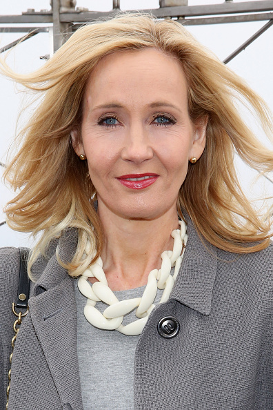 NEW YORK, NY - APRIL 09:  Founder and President of Lumos and Patron of Lumos USA/ Author J.K. Rowling ceremoniously lights the Empire State Building in LumosÕ colors of purple, blue and white to mark the US launch of her non-profit organization at The Empire State Building on April 9, 2015 in New York City.  (Photo by Cindy Ord/Getty Images)