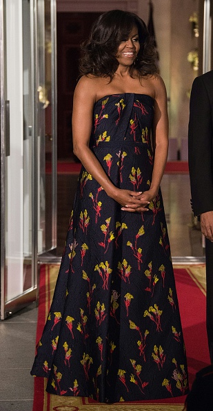 US First Lady Michelle Obama waits for the arrival of Canadian Prime Minister Justin Trudeau (R) and his wife Sophie Gregoire Trudeau fdor a State Dinner in their honor at the White House in Washington, DC, on March 10, 2016. / AFP / Nicholas Kamm        (Photo credit should read NICHOLAS KAMM/AFP/Getty Images)