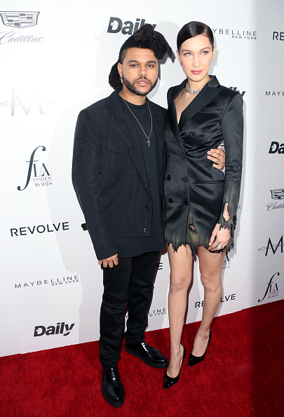 WEST HOLLYWOOD, CA - MARCH 20: Singer The Weeknd (L) and model Bella Hadid attend the Daily Front Row "Fashion Los Angeles Awards" at Sunset Tower Hotel on March 20, 2016 in West Hollywood, California.  (Photo by Frederick M. Brown/Getty Images)