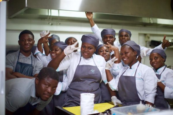 Chef Ruby Paintsil and her kitchen team