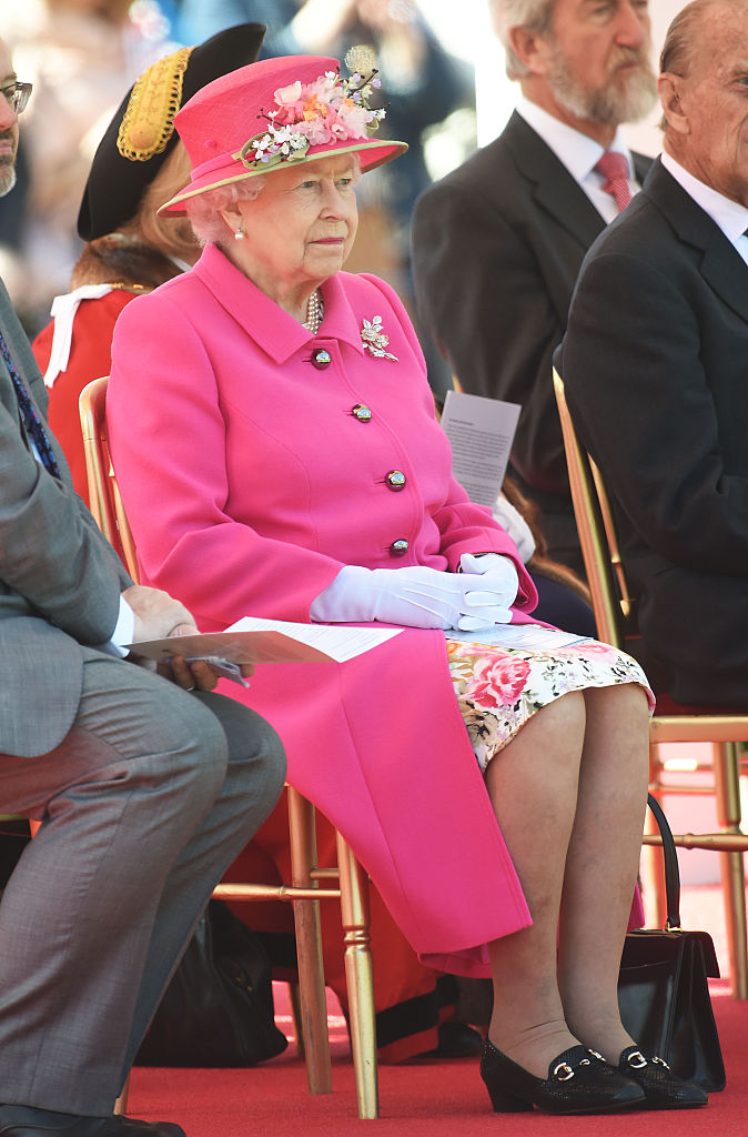 WINDSOR, ENGLAND - APRIL 20: Queen Elizabeth II watches a performance of locals acts to open the Alexandra Gardens Bandstand as part of her 90th Birthday celebrations In Windsor on April 20, 2016 in Windsor, England. (Photo by Stuart C. Wilson/Getty Images)