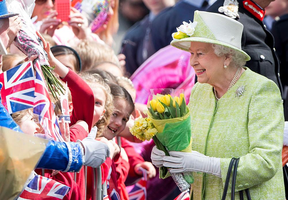 WINDSOR, ENGLAND - APRIL 21: Queen Elizabeth II on a walkabout to celebrate the Queen's 90th Birthday on April 21, 2016 in Windsor, England. (Photo by Mark Cuthbert/UK Press via Getty Images)