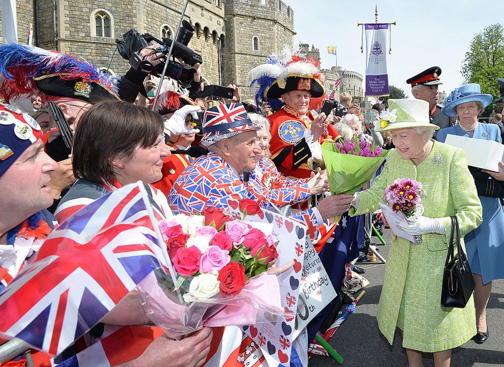 WINDSOR, ENGLAND - APRIL 21: Queen Elizabeth II meets the public on her 90th Birthday Walkabout on April 21, 2016 in Windsor, England. Today is Queen Elizabeth II's 90th Birthday. The Queen and Duke of Edinburgh will be carrying out engagements in Windsor. (Photo by John Stillwell - WPA Pool/Getty Images)