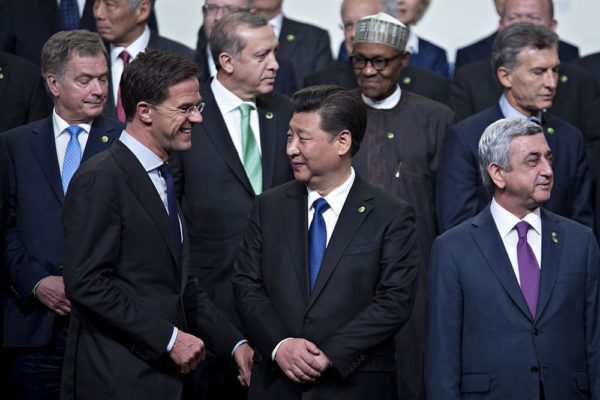 Serzh Sargsyan, Armenia's president, from right, Xi Jinping, China's president, and Mark Rutte, Dutch prime minister, stand during a family photo at the Nuclear Security Summit in Washington, D.C., U.S., on Friday, April 1, 2016. After a spate of terrorist attacks from Europe to Africa, U.S. President Barack Obama is rallying international support during the summit for an effort to keep Islamic State and similar groups from obtaining nuclear material and other weapons of mass destruction. Photographer: Andrew Harrer/Bloomberg via Getty Images