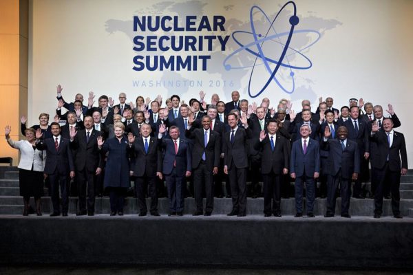 U.S. President Barack Obama, center, waves among other heads of state and attendees during a family photo at the Nuclear Security Summit in Washington, D.C., U.S., on Friday, April 1, 2016. After a spate of terrorist attacks from Europe to Africa, Obama is rallying international support during the summit for an effort to keep Islamic State and similar groups from obtaining nuclear material and other weapons of mass destruction. Photographer: Andrew Harrer/Bloomberg via Getty Images