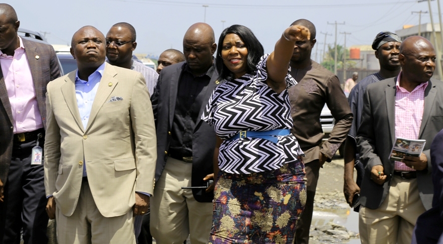 L-R: Lagos State Governor, Akinwunmi Ambode; Managing Director, Lagos State Waterways Authority (LASWA), Engr. Abisola Kamson and Commissioner for Waterfront Infrastructure Development, Engr. Adebowale Akinsanya during the Governor’s inspection of the bad portion of Berlett Bus Stop on Apapa- Oshodi Expressway, Lagos, on Friday, May 13, 2016.