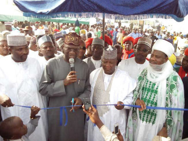 PIC 1. FROM LEFT: SPEAKER, ZAMFARA STATE HOUSE OF ASSEMBLY, ALHAJI SANUSI RIKIJI; MINISTER OF POWER,  WORKS AND HOUSING, MR BABATUNDE FASHOLA; GOV ABDULAZIZ YARI OF ZAMFARA STATE; AND EMIR OF ANKA, ALHAJI  ATTAHIRU AHMAD CUTTING THE TAPE TO INAUGURATE THE ANKA LOCAL GOVERNMENT ELECTRIFICATION PROJECT AT ANKA  LGA HEADQUATERS, ZAMFARA STATE ON SATURDAY (28/5/16). 3886/28/5/2016/ISAHQ/DKO/ICE/NAN