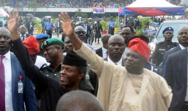 PIC. 12. VICE PRESIDENT YEMI OSINBAJO (L) AND GOV. AKINWUNMI AMBODE OF LAGOS STATE ACKNOWLEDGING CHEERS FROM THE CROWD ON ARRIVAL AT TAFAWA BALEWA SQUARE VENUE FOR THE INAUGURATION OF SOME SECURITY EQUIPMENT, DURING THE WORKING VISIT OF THE VICE PRESIDENT TO LAGOS STATE AS REPRESENTATIVE OF PRESIDENT MUHAMMADU BUHARI ON MONDAY (23/7/16). 3750/23/5/2016/BOA/MA/NAN