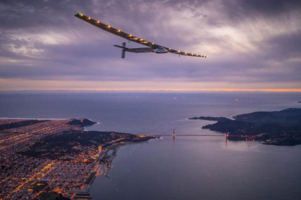 "Solar Impulse 2", a solar-powered plane piloted by Bertrand Piccard of Switzerland, flies over the Golden Gate bridge in San Francisco, California, U.S. April 23, 2016, before landing on Moffett Airfield following a 62-hour flight from Hawaii. Jean Revillard/Solar Impulse/Handout via REUTERS