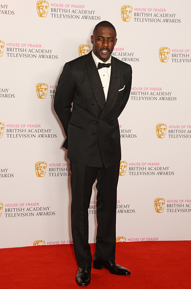 Idris Elba poses in the winners room at the House Of Fraser British Academy Television Awards 2016 at the Royal Festival Hall on May 8, 2016 in London, England.