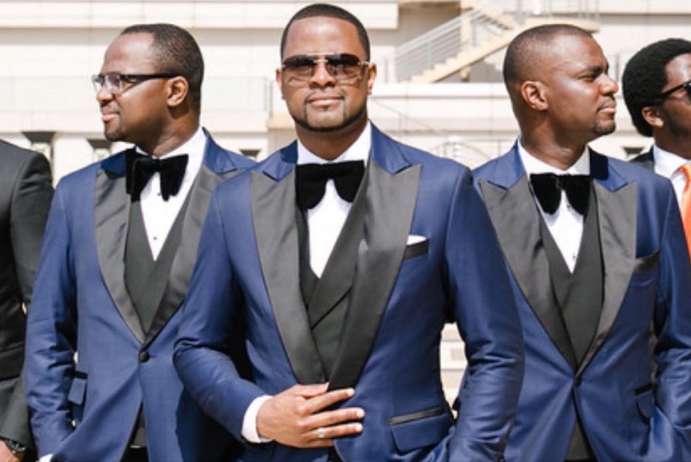 in Suits by Mai Atafo for DJ Xclusive's wedding