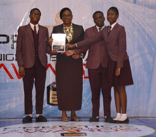 Caleb International College representative after winning Best Secondary School in Lagos (Private) Award