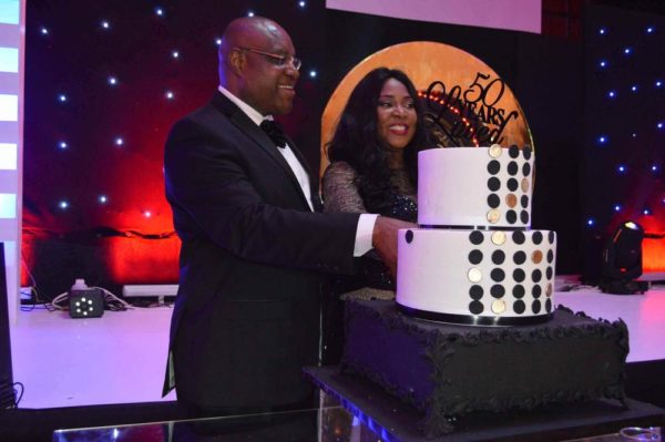 Celebrant cutting his cake