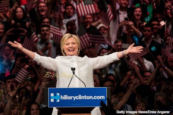 NEW YORK, NY - JUNE 7: Democratic presidential candidate Hillary Clinton arrives onstage during a primary night rally at the Duggal Greenhouse in the Brooklyn Navy Yard, June 7, 2016 in the Brooklyn borough of New York City. Clinton has secured enough delegates and commitments from superdelegates to become the Democratic Party's presumptive presidential nominee. She will become the first woman in U.S. history to secure the presidential nomination of one of the country's two major political parties. (Photo by Drew Angerer/Getty Images)