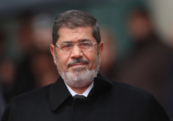 BERLIN, GERMANY - JANUARY 30:  Egyptian President Mohamed Mursi arrives at the Chancellery to meet with German Chancellor Angela Merkel on January 30, 2013 in Berlin, Germany. Mursi has come to Berlin despite the ongoing violent protests in recent days in cities across Egypt that have left at least 50 people dead. Mursi is in Berlin to seek both political and financial support from Germany.  (Photo by Sean Gallup/Getty Images)