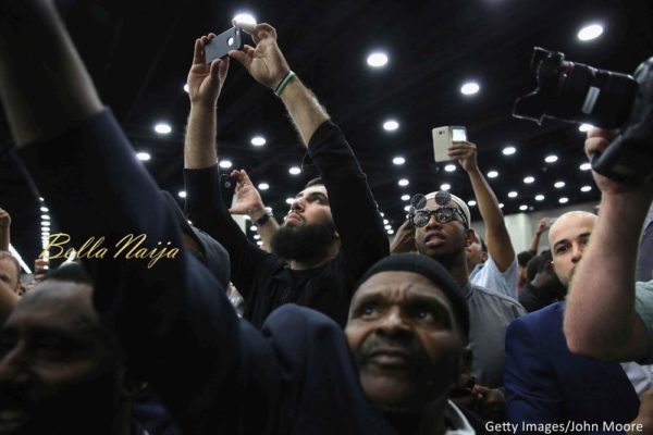 People photograph the casket with the body of Muhammad Ali during at an Islamic prayer service at the Kentucky Exposition Center on June 9, 2016 in Louisville, Kentucky.