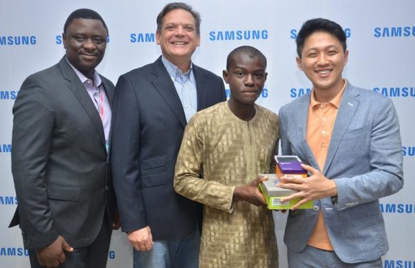 L-R: Director, Information Technology and Mobile, Mr. Olumide Ojo; Director & Business Leader, Information Technology and Mobile, Mr. Emmanouil Revmatas, both of Samsung Electronics West Africa; Winner, Samsung “Inspire Bigger Dreams” contest, Ibrahim Salihu, and Manager, Product Marketing, Samsung Electronics West Africa, Mr. Chaejin Im during the presentation of Samsung mobile devices to winners of its just concluded campaign at Samsung Offices, VI