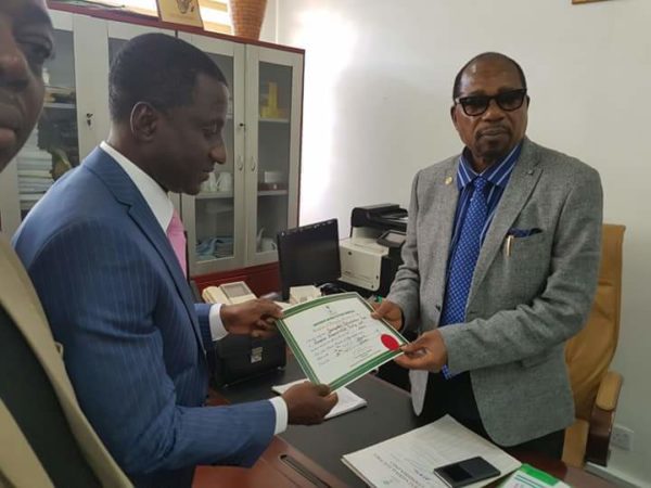 Uche Ogah receiving the Certificate of Return