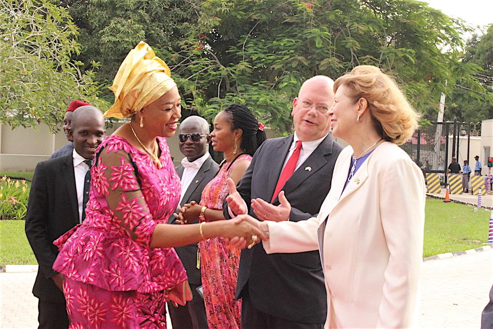 United States Ambassador to Nigeria, James F. Entwistle (middle), with his wife, Dr. Pamela G. Schmoll (right), welcoming the representative of the Nigerian Minister of Foreign Affairs, Vivian Okeke