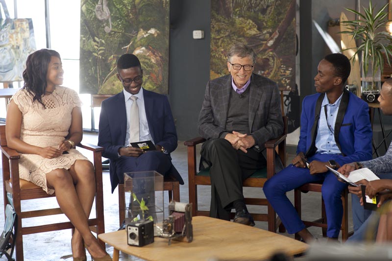 Bill Gates with the panelists