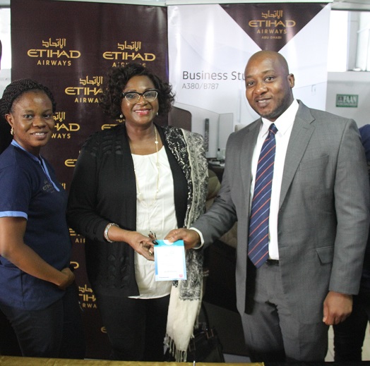 L-R; Marketing lead Etihad Airways Folasade Akinboro, Premium guest, Airport manager Etihad Airways Percival Uwechue