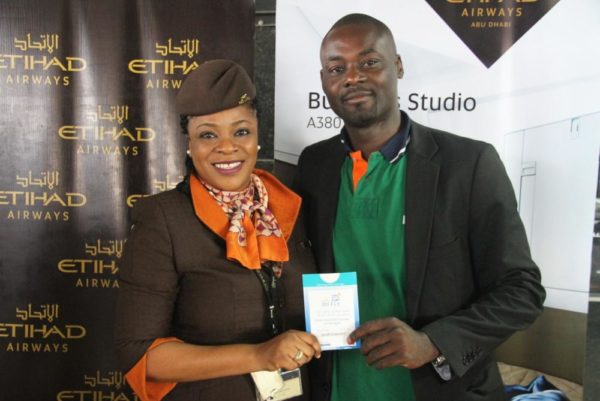 L-R; Airport officer Etihad Airways Bunmi ogunbiyi , Abiodun Sotunde Gold card holder 