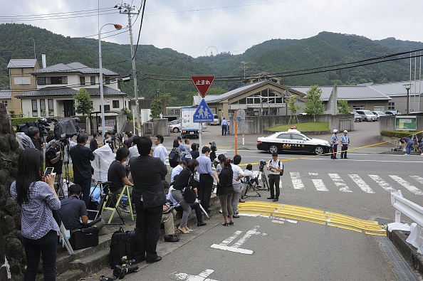SAMIGAHARA, JAPAN - JULY 26 : Police and reporters are seen on the site where Satoshi Uematsu, 26, killed 19 and wounding 25 in knife attack in a residential care for people with disabilities on July 26, 2016, in Sagimahara city, Kanagawa Prefecture, in western of Tokyo, Japan. (Photo by David Mareuil/Anadolu Agency/Getty Images)