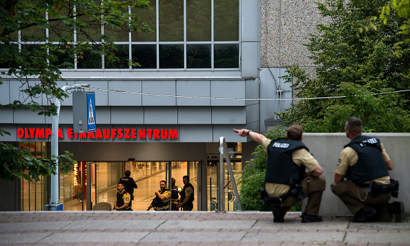 MUNICH, GERMANY - JULY 22: Police officers respond to a shooting at the Olympia Einkaufzentrum (OEZ) at July 22, 2016 in Munich, Germany. According to reports, several people have been killed and an unknown number injured in a shooting at a shopping centre in the north-western Moosach district in Munich. Police are hunting the attacker or attackers who are thought to be still at large. (Photo by Joerg Koch/Getty Images)