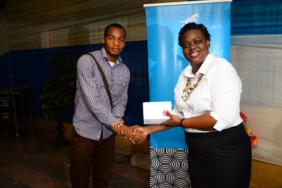 Omotola Oyebanjo presenting gifts to participants