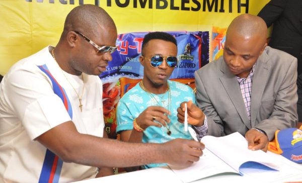 Chief Ogo Emenike,Managing Director,Tummy Tummy Foods Industries Limited;Ijemba Ekenedilichukwu[Humblesmith]Brand Ambassador and Mr. Chijioke Anumoka,General Manager,Tummy Tummy Foods Industries Limited.At the Unveiling of Humble smith as Brand Ambassador of Tummy Tummy Foods Industries Limited in Lagos yesterday.