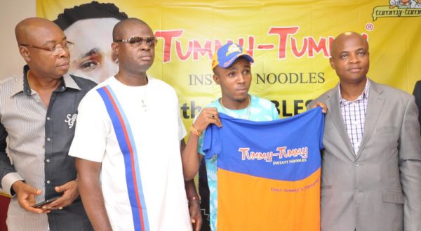 Chief Udoka Ejiakor,Marketing Consultant Lagos & Ogun,Tummy Tummy foods industries limited; Chief Ogo Emenike,Managing Director,Tummy Tummy Foods Industries Limited;Ijemba Ekenedilichukwu[Humblesmith]Brand Ambassador and Mr. Chijioke Anumoka,General Manager,Tummy Tummy Foods Industries Limited.At the Unveiling of Humble smith as Brand Ambassador of Tummy Tummy Foods Industries Limited in Lagos yesterday
