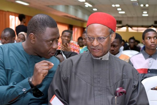  L-R: Kunle Soriyan engrossed in discussion with Chief Emeka Anyaoku as the latter listens intently at the #IYD2016NG event.