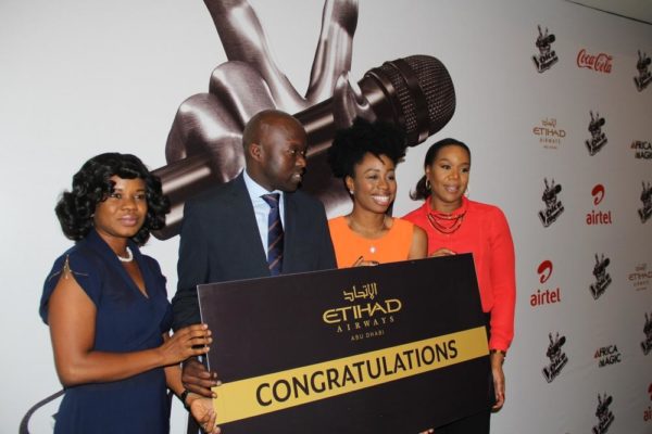 (L-R) Folashade Akinboro, Etihad Marketing Officer, Nigeria; George Mawadri, Etihad Airways’ General Manager, Nigeria; Agharese Emokpae, winner of the first season of The Voice Nigeria and Wangi Mba-Uzoukwu, Director, M-Net, West Africa at the prize presentation of  her tickets to Abu Dhabi by Etihad Airways recently