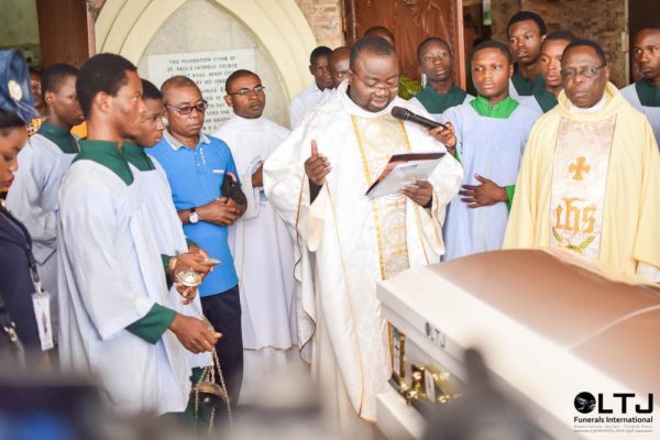 Day 1 H - Casket being recieved by the clergy