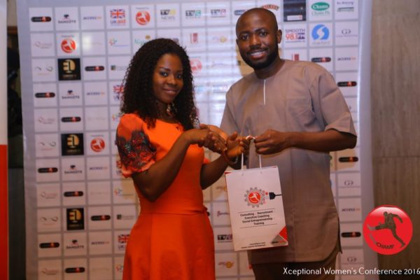 Gbani Ekpiobari a VIP Delegate receiving her VIP Pack