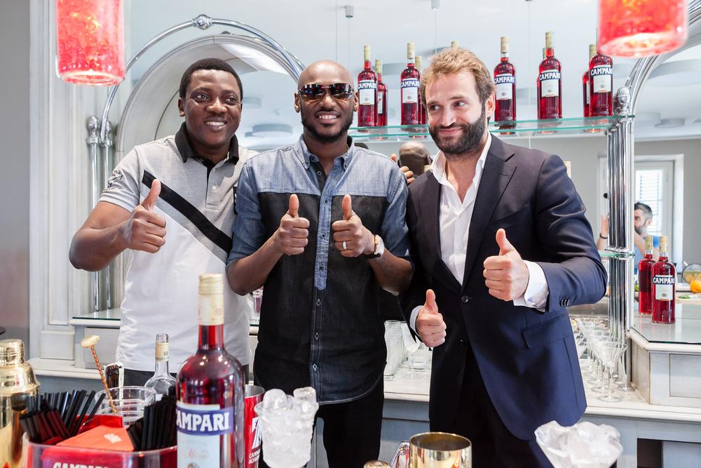 Head of Marketing, Brian Munro, Abayomi Ajao, Campari ambassador, 2Baba and Campari Materclass trainer, Tommaso Cessa at the home of Campari in Milan, Italy on Wednesday, August 3, 2016