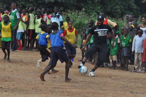 Okocha at 43 with IDP in Abuja 1