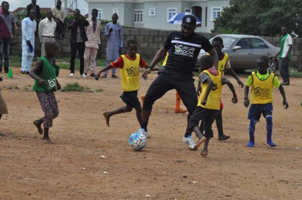 Okocha at 43 with IDP in Abuja 4