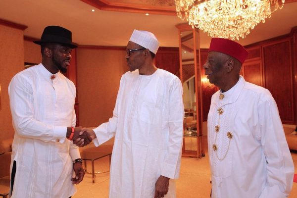 President Buhari and Joseph Yobo