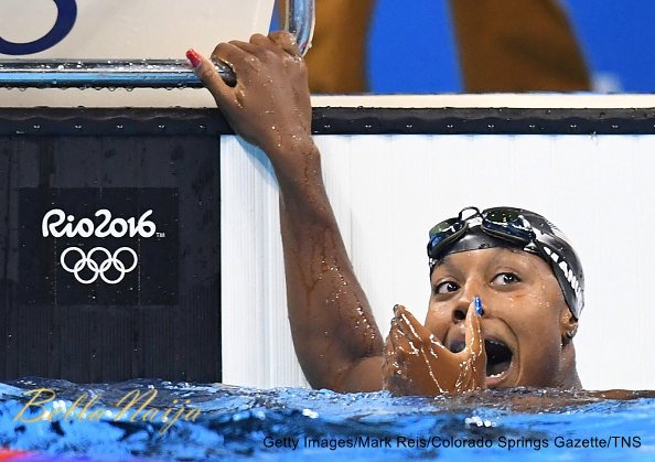 U.S. swimmer Simone Manuel reacts after seeing her first-place finish on the scoreboard in the women's 100m freestyle at the Olympic Aquatics Stadium in Rio de Janeiro, Brazil, on Thursday, Aug. 11, 2016. (Mark Reis/Colorado Springs Gazette/TNS)