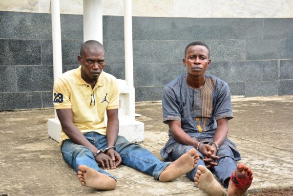 The suspected kidnappers of the Oniba of Iba, Toba Forejo (right) and Isaiah Ododomu (left) being paraded by the Police, at the Lagos House, Ikeja, on Sunday, August 7, 2016.