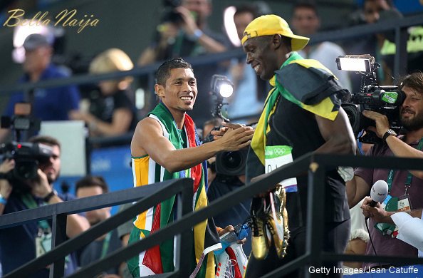 RIO DE JANEIRO, BRAZIL - AUGUST 14: Gold medalist for the men's 400m Wayde Van Niekerk of South Africa congratulates gold medalist of the men's 100m Usain Bolt of Jamaica on day 8 of the Rio 2016 Olympic Games at Olympic Stadium on August 14, 2016 in Rio de Janeiro, Brazil. (Photo by Jean Catuffe/Getty Images)