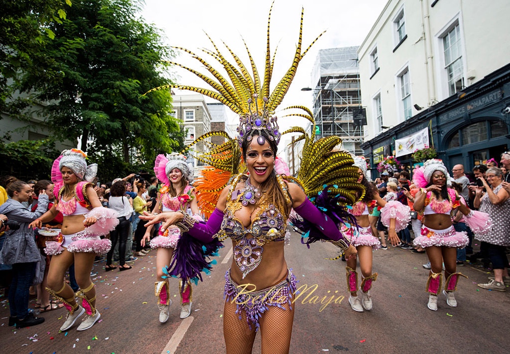 LONDON, ENGLAND - AUGUST 29: Performers take part in the Notting Hill Carnival on August 29, 2016 in London, England. The Notting Hill Carnival, which has taken place annually since 1964, is expected to attract over a million people. The two-day event, started by members of the Afro-Caribbean community, sees costumed performers take to the streets in a parade and dozens of sound systems set up around the Notting Hill streets. (Photo by Jack Taylor/Getty Images)