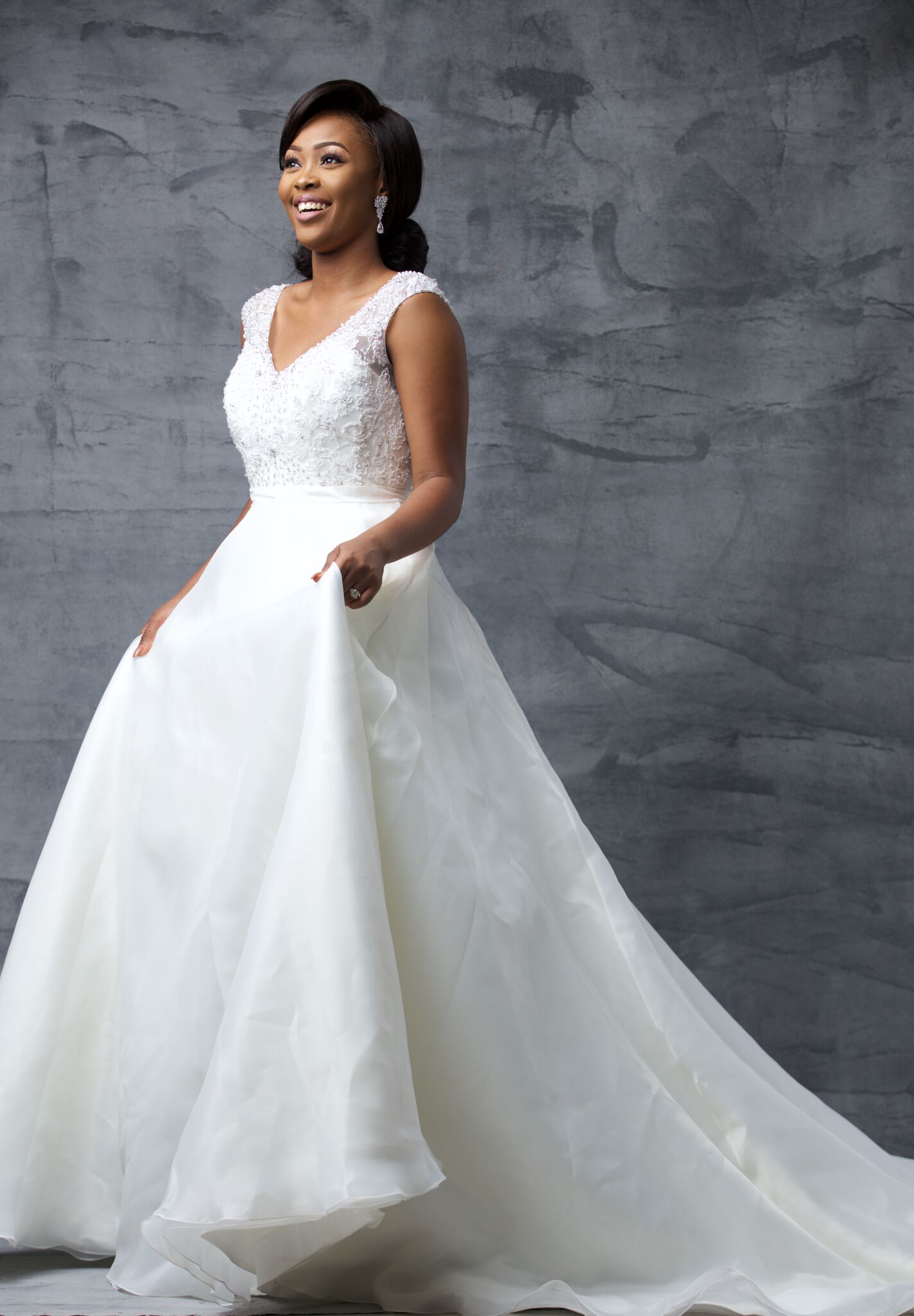 Estella: She is the bride who loves embellished simplicity. She loves clean lines and this is her subtle take on the classic ball gown silhouette.