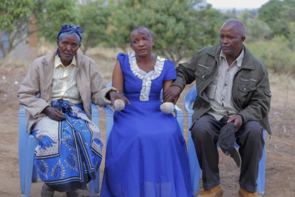 Jackline Mwende with her parents at their home in Machakos, Kenya