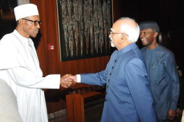 PIC.5. PRESIDENT MUHAMMDU BUHARI WELCOMING THE VISITING VICE PRESIDENT OF INDIA, MR MOHAMMAD HAMID ANSARI TO THE PRESIDENTIAL VILLA IN ABUJA ON TUESDAY (27/9/16). RIGHT IS VICE PRESIDENT YEMI OSINBAJO. 7137/27/9/2016/CALLISTUS EWELIKE/DKO/BJO/NAN